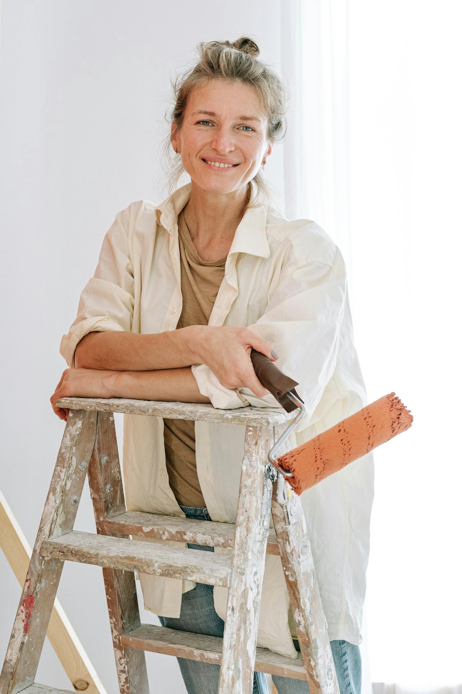 Friendly professional Long Island painter with a roller
